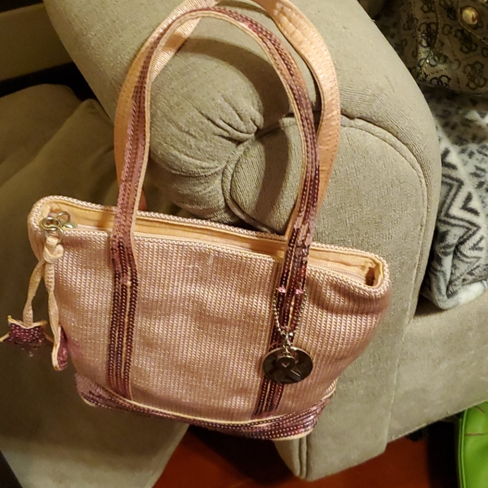 THE SAK very good condition like  new